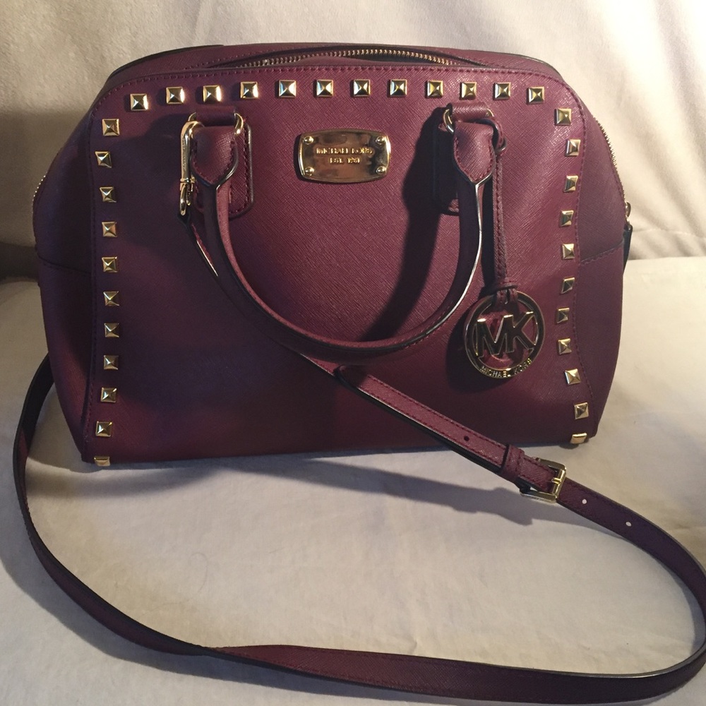 Deep  Red Micheal Kors hand bag, w gold hardware